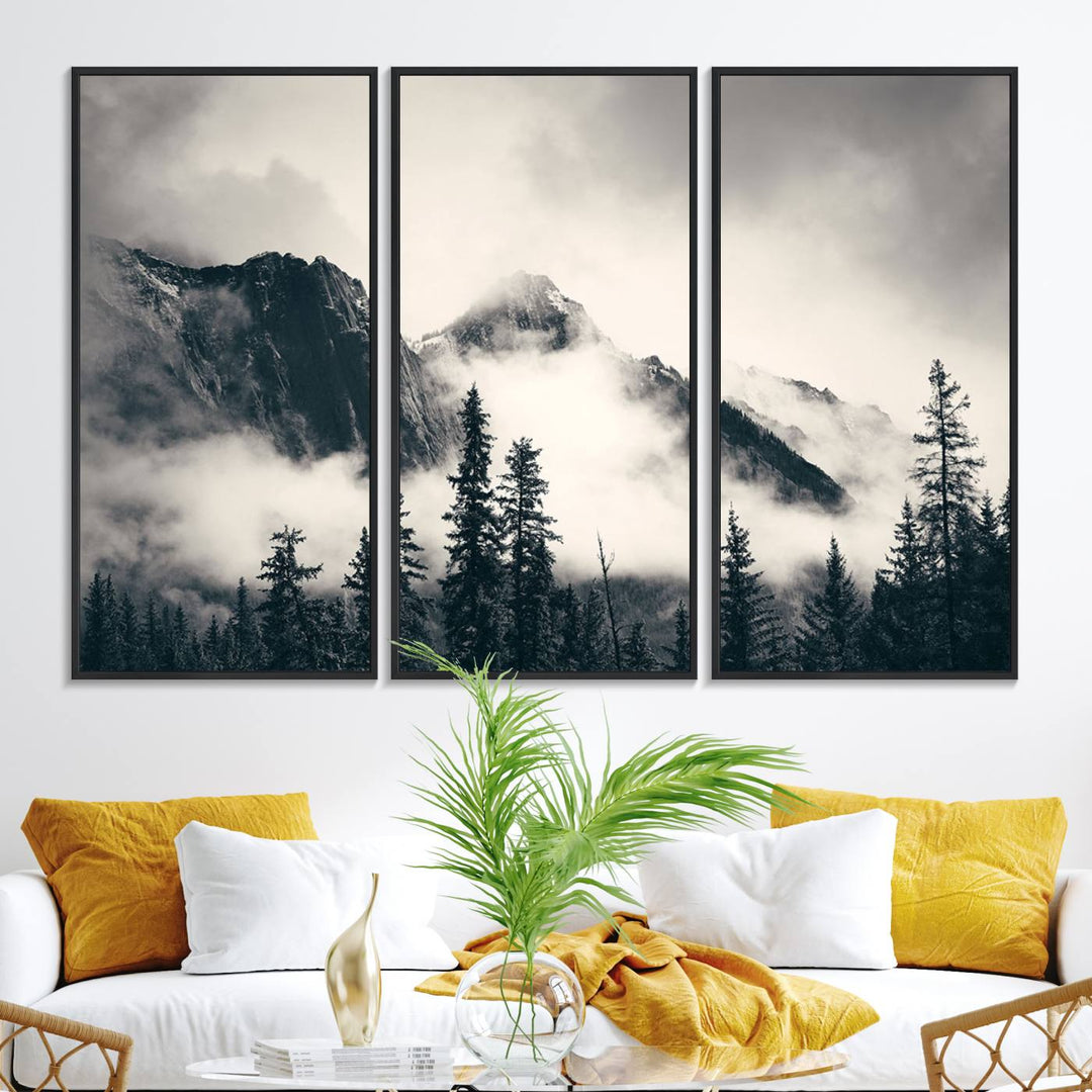 A large foggy mountain forest canvas print hangs prominently in the room.