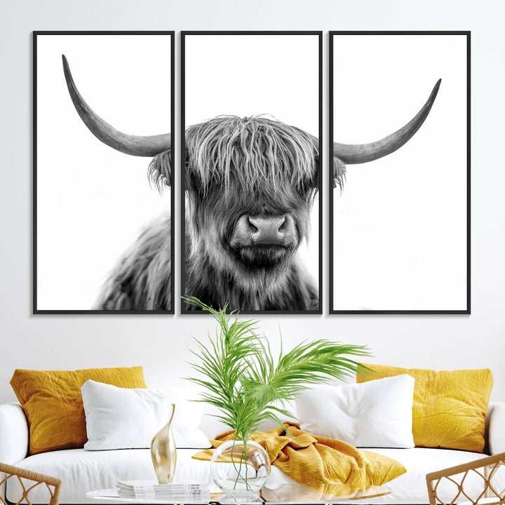 A Scottish Highland Cow Art Canvas adds charm to the farmhouse decor.