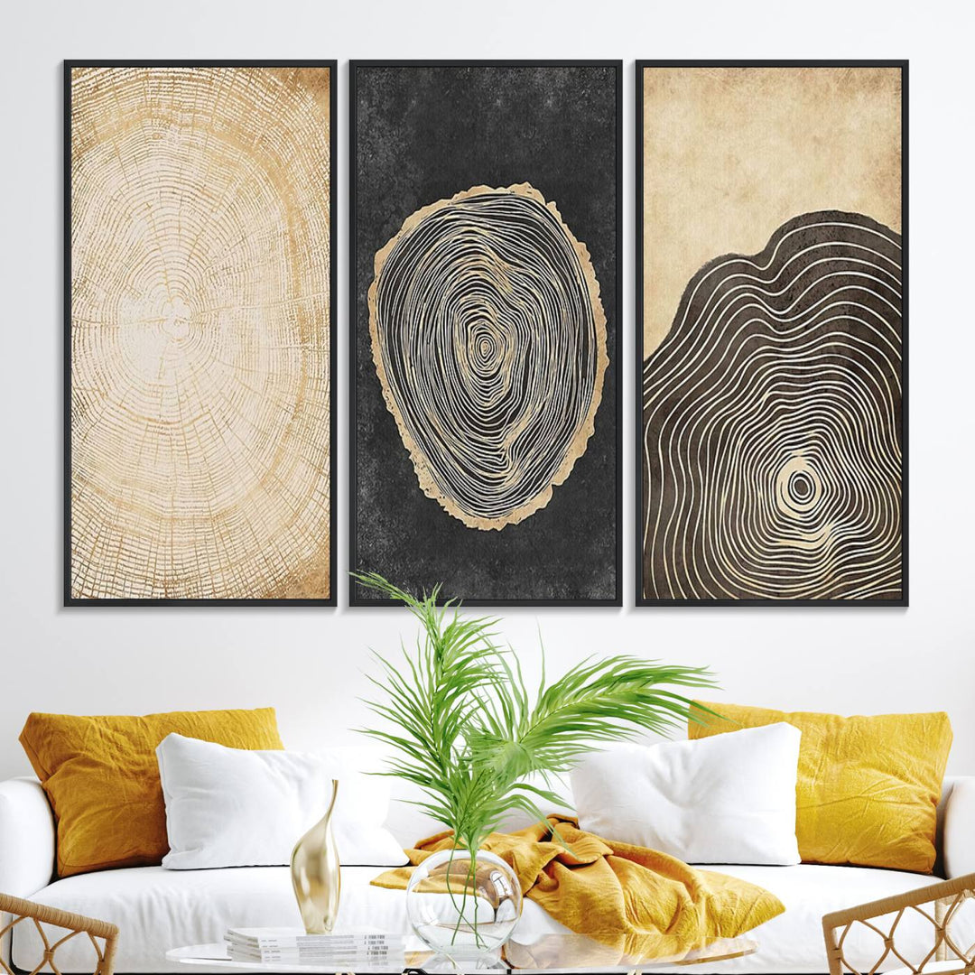 Tree Rings Canvas Wall Art Print hangs prominently in a modern kitchen.