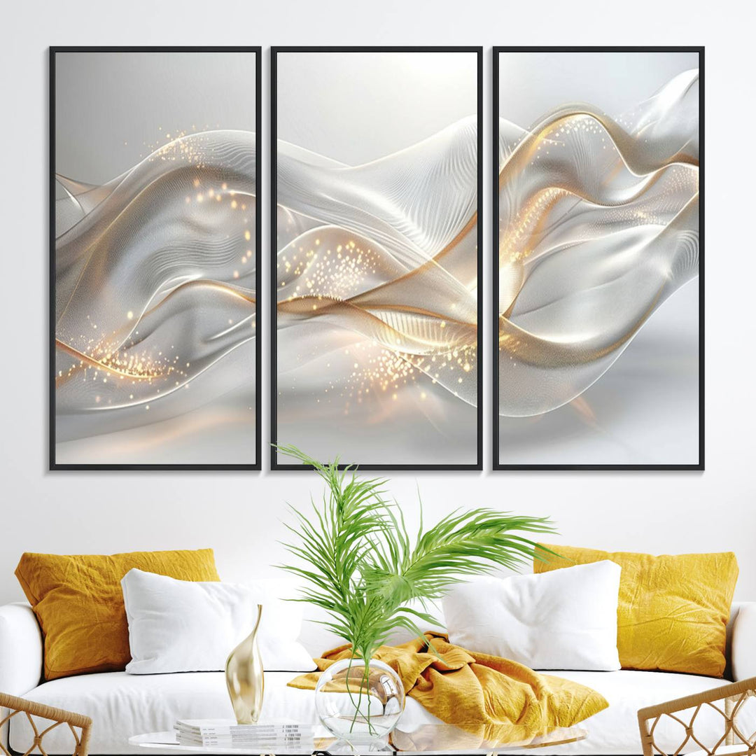 A modern living room is enhanced by the Abstract Art Grey and Gold Lines Wall Art, its elegant lines shimmering against a dark wall.