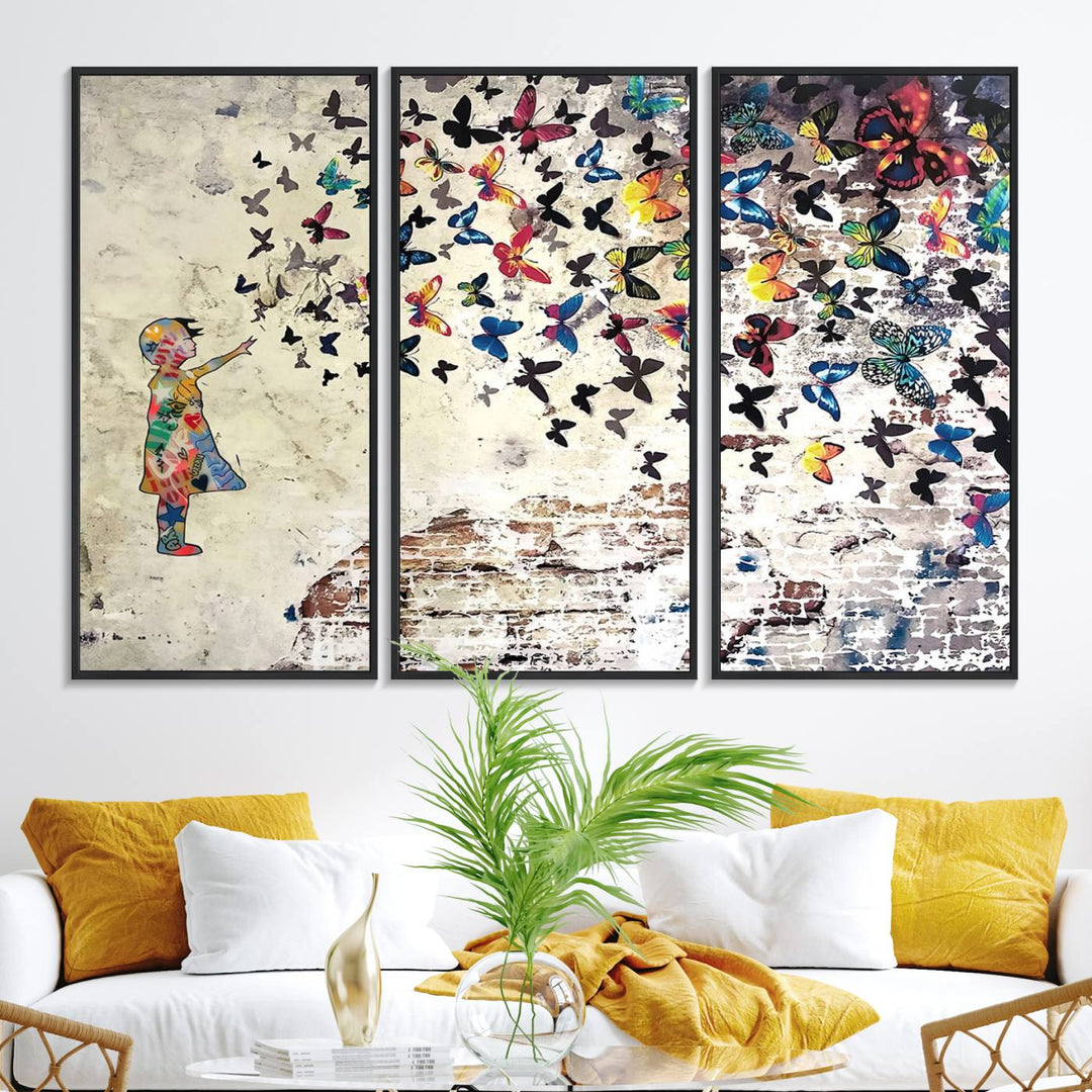 A Banksy Girl Butterfly Canvas Print is displayed on the textured wall.