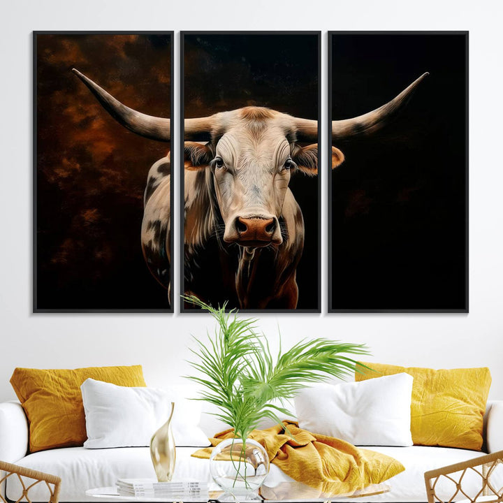 A large 3-panel Texas Longhorn canvas print dominates the space.