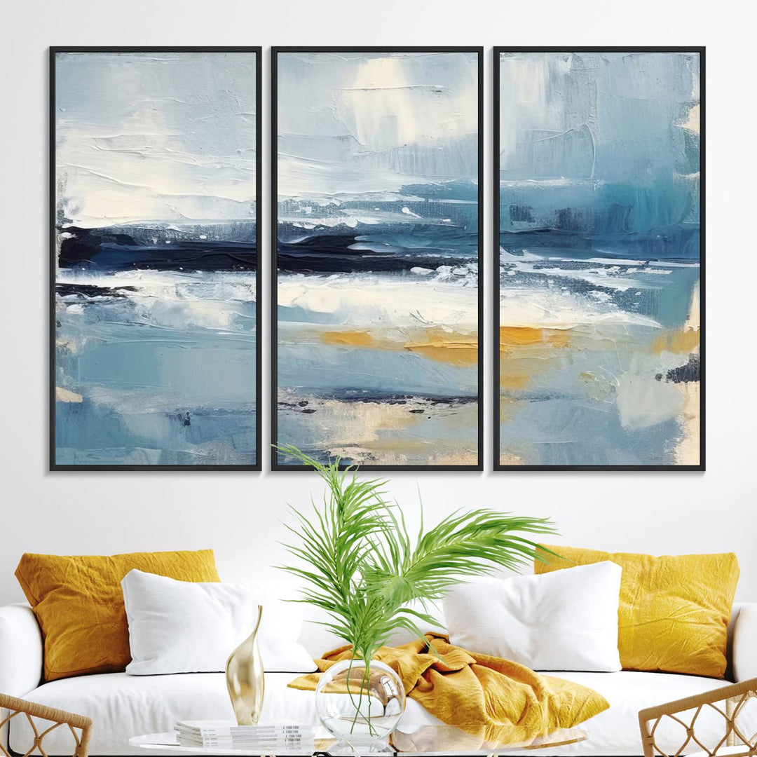 The Abstract Ocean Canvas Wall Art in coastal blue and gold enhances the modern kitchen.