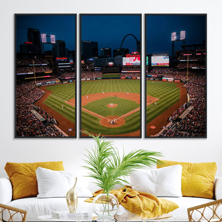 A St. Louis Cardinals Baseball Team print of Busch Stadium at night adorns the wall.