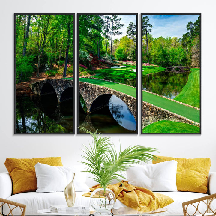 The wall art from Augusta National Golf Club showcases a panoramic bridge set against rich, lush greenery on a framed triptych canvas.