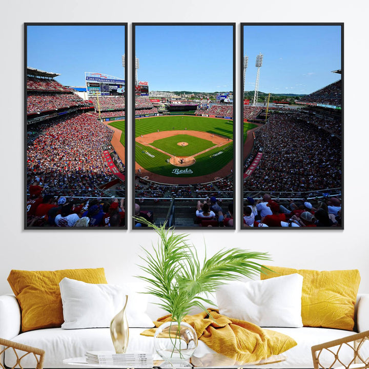 The Cincinnati Reds Baseball Team print of Great American Ball Park Stadium adorns the wall.