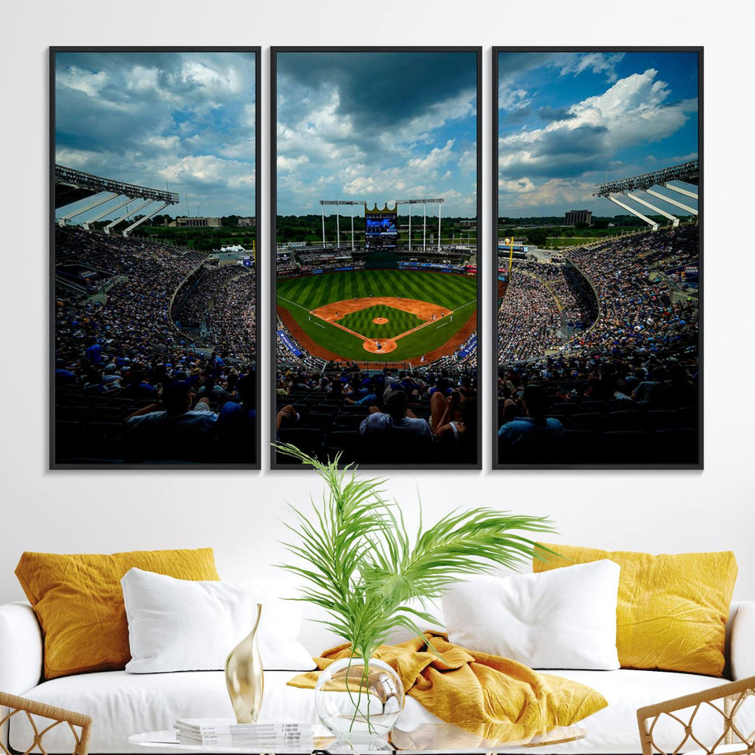 A 3-panel print of Kauffman Stadium, showcasing a crowded baseball field under cloudy skies.