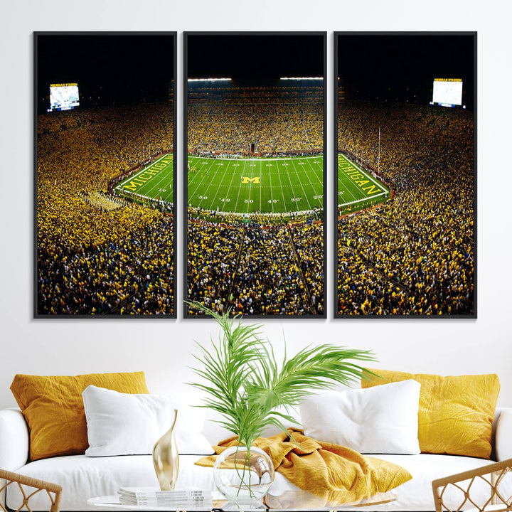 Aerial view of Michigan Stadium night game, ideal for Michigan Wolverines Football Team displayed on a triple canvas wall art.