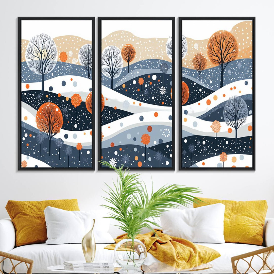 The "Abstract Winter Landscape Canvas Wall Art Print," featuring a triptych of landscapes with trees and hills in vibrant orange, white, and blue hues, adds a gallery-quality finish that transforms the space into an art lover's dream.