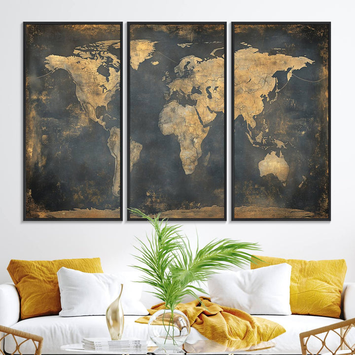 The Grunge World Map Canvas Wall Art features golden tones and is displayed against a white-paneled wall.
