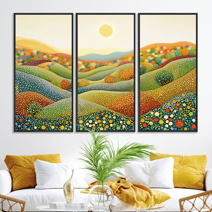 The YAYOI KUSAMA Colorful Dot Art Landscape Canvas, a framed abstract pointillism piece inspired by nature featuring vibrant rolling hills and a sun, adds gallery-quality elegance to your living space.