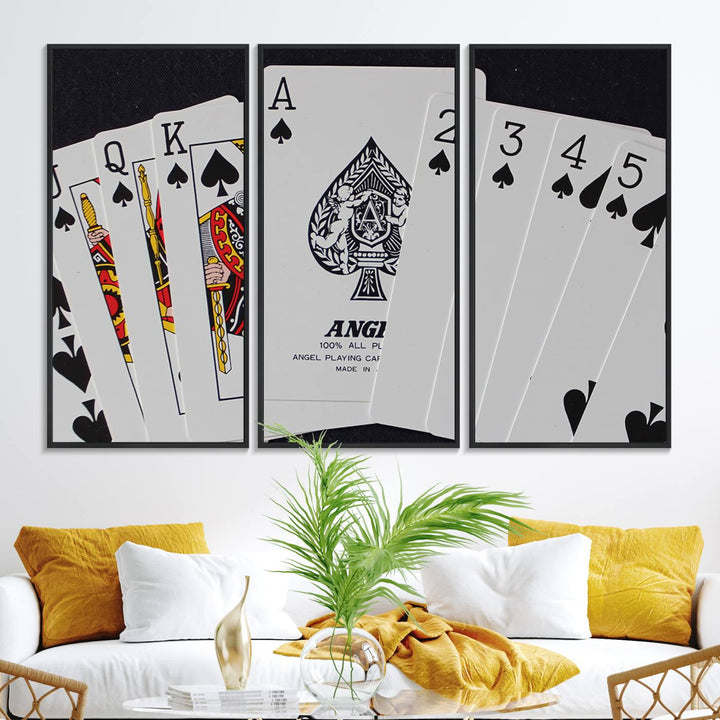 The Poker Wall Art - Playing Cards Canvas Wall Art Print features an Ace of Spades and Royal Flush design. This piece adds a classic charm to any space with its subtle emphasis on the Ace of Spades, making it perfect for game room decor.