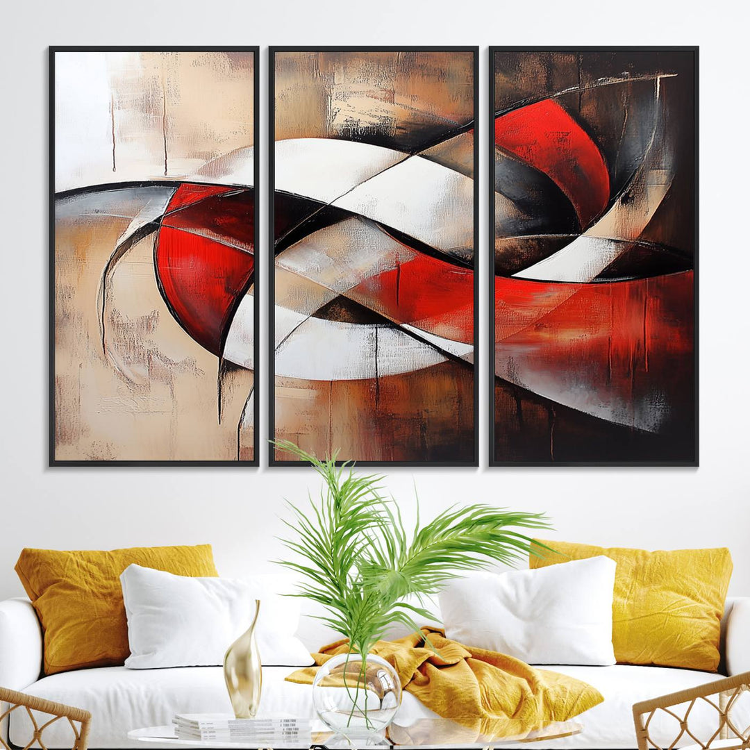 The "Abstract Wall Art - Modern Red and White Canvas Wall Art Print" features bold geometric shapes in red, black, and white on a beige background, enhancing contemporary aesthetics. This canvas print adds a striking focal point to any room, beautifully complementing the modern vibe of the space.