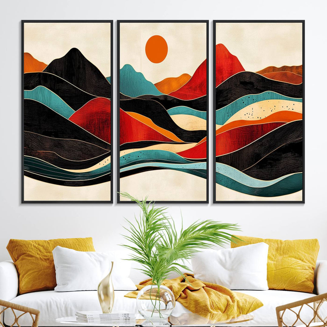 The Colorful Western Triptych Canvas features a vibrant mountain and sun design, making it perfect for modern kitchens or log cabin walls.