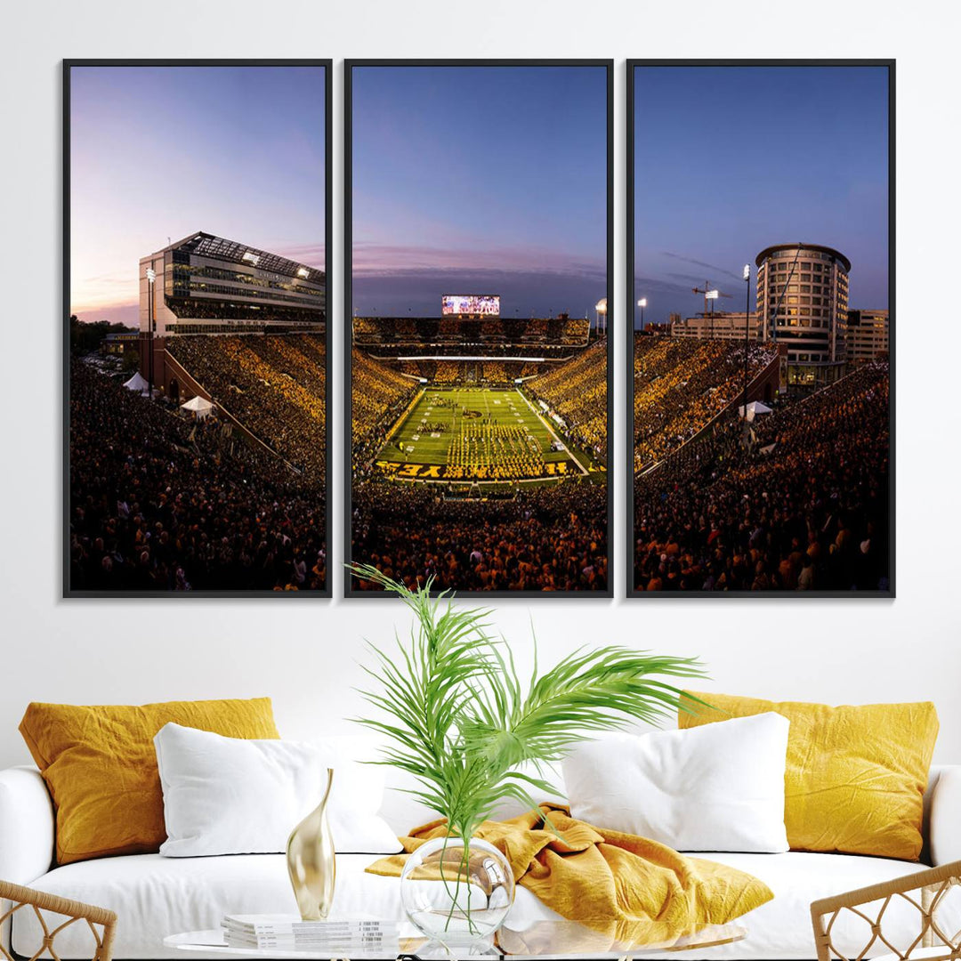 The Iowa Hawkeyes Kinnick Stadium Wall Art Canvas Print captures a sunset scene, making it perfect for display on a wall.