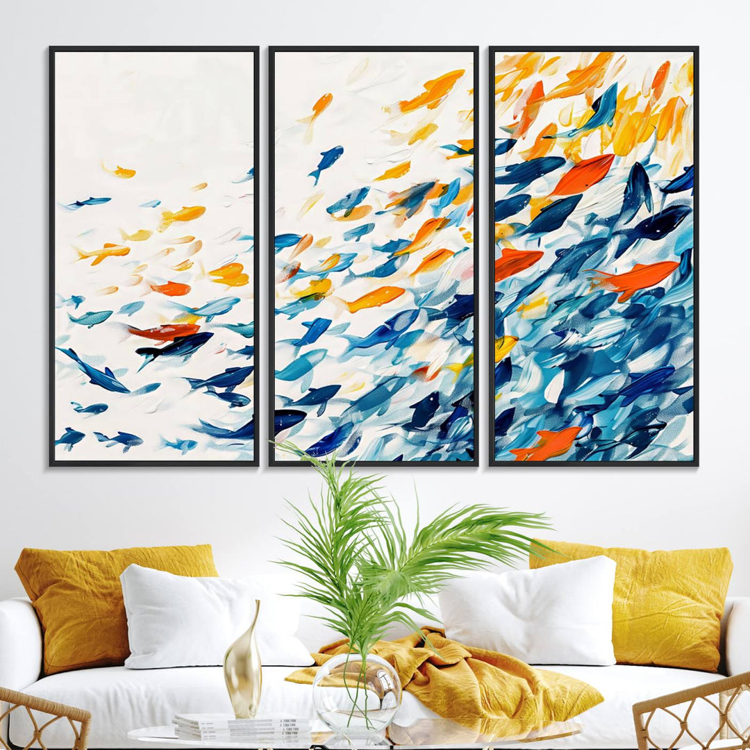 A colorful Abstract Fish Shoal Canvas Print hangs on the wall.