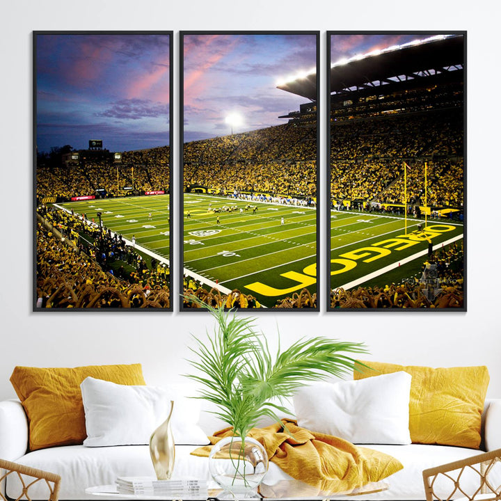 This gallery-quality canvas print features a depiction of the OREGON field filled with fans at sunset, capturing the essence of the University of Oregon Ducks Autzen Stadium.