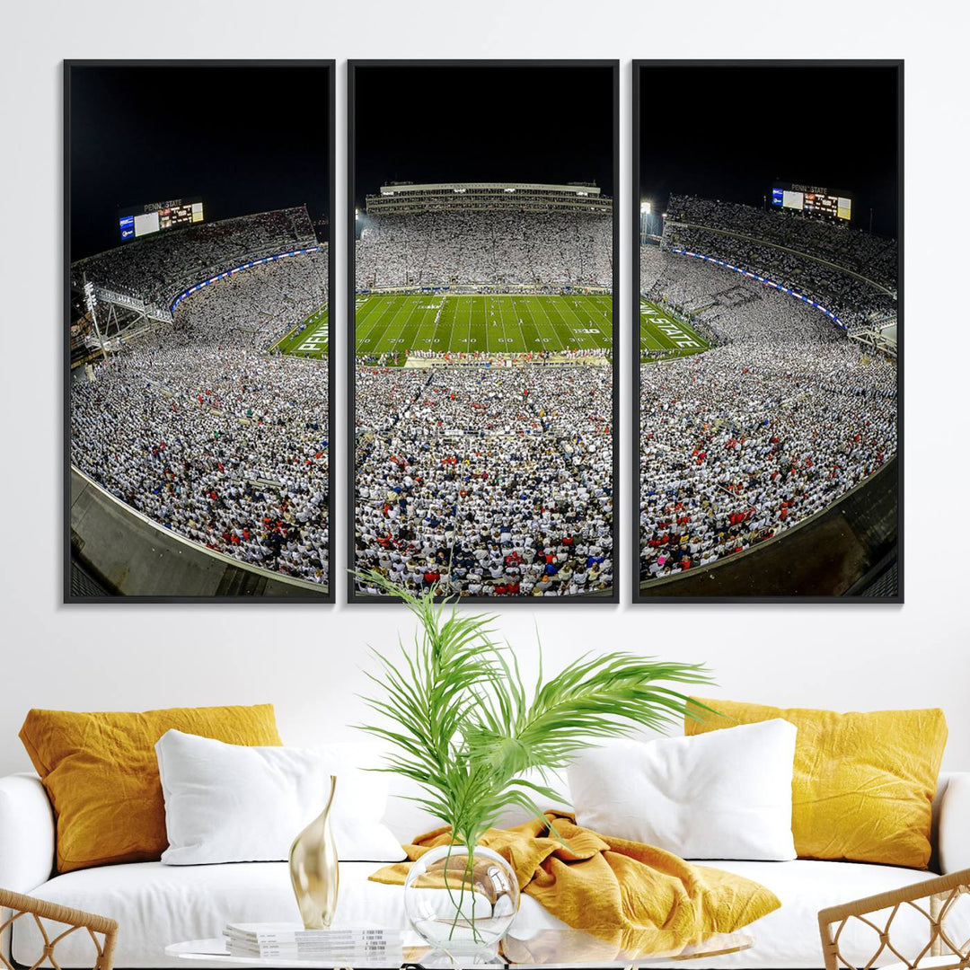 The triple canvas wall art depicts Beaver Stadiums vibrant atmosphere during a night game from the end zone.