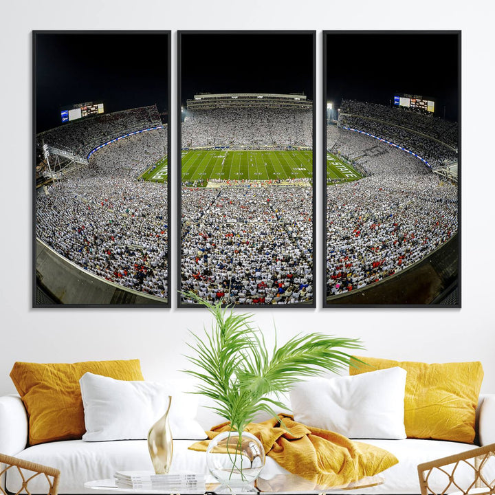 The triple canvas wall art depicts Beaver Stadiums vibrant atmosphere during a night game from the end zone.