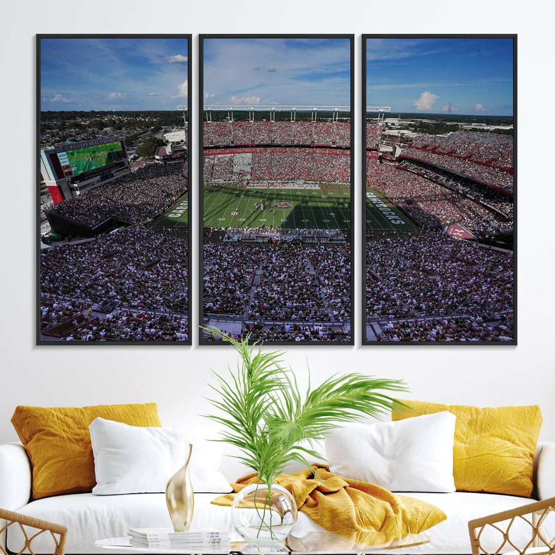 The wall art is a South Carolina Gamecocks print, showcasing Williams-Brice Stadium from a distance under clear skies.