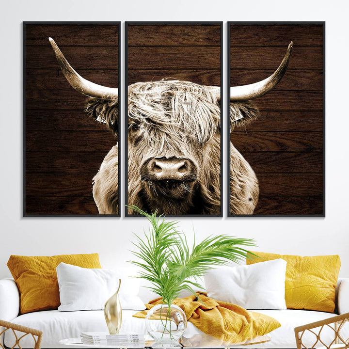 Highland Cow Wall Art Canvas Print: Majestic Scottish bull on rustic decor, ready to hang.