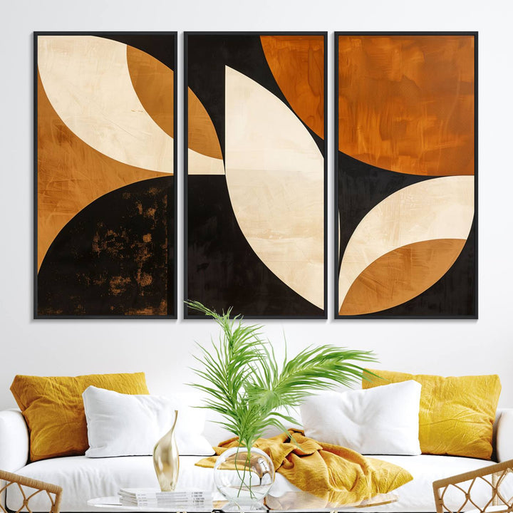 Geometric abstract wall art print featuring leaf shapes in brown, beige, and black.