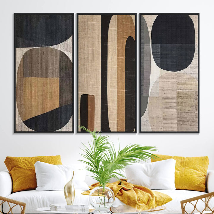 A modern dining room featuring neutral geometric boho abstract minimalist canvas art.