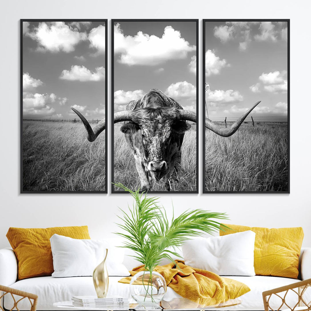 Longhorn Cow Field Canvas Print featuring rustic charm with a windmill backdrop.