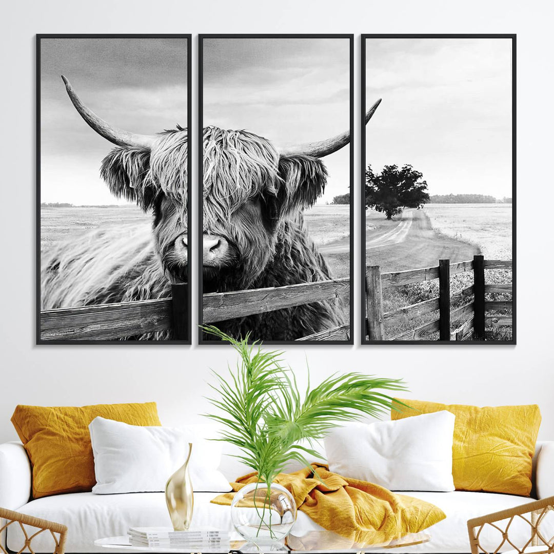 The Scottish Highland Cow Wall Art, a black and white canvas print, enhances rustic farmhouse décor.