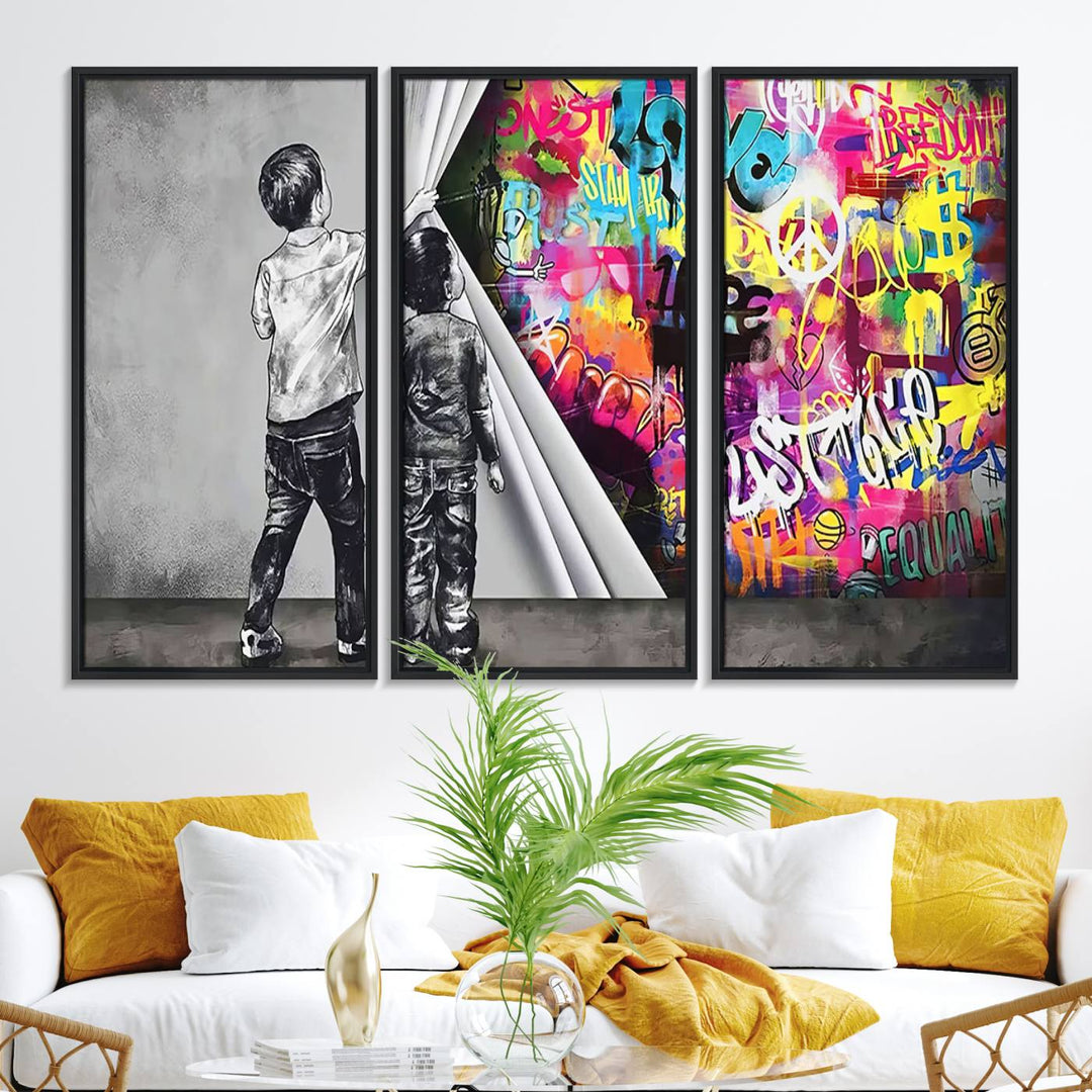 The Banksy Print - Street Art Canvas features a vibrant and bold image of two children lifting a curtain to reveal colorful graffiti. It's ready to hang, adding an urban modern decor vibe.