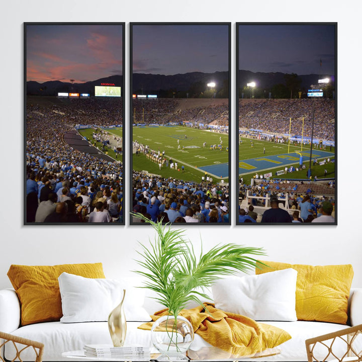 Admire the stunning wall art canvas depicting a UCLA Bruins game with a sunset over the Pasadena Rose Bowl Stadium.