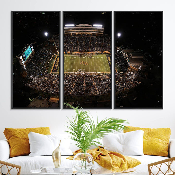 Canvas wall art displays an aerial view of Wake Forest Demon Deacons stadium at night.