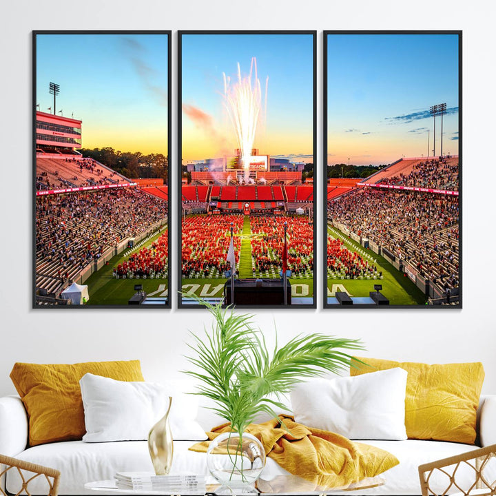 A vibrant North Carolina State University Wolfpack print, capturing a people-filled stadium, fireworks, and a sunset—perfect for your living room wall.