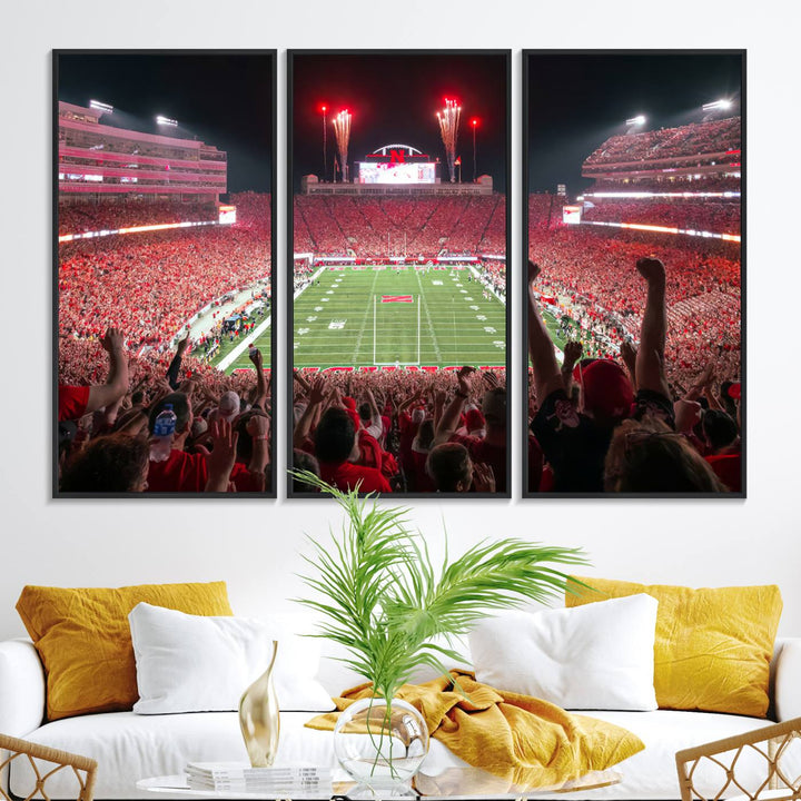 A vibrant canvas print of the Lincoln Memorial Stadium at night with fireworks, featuring the University of Nebraska Cornhuskers Football.