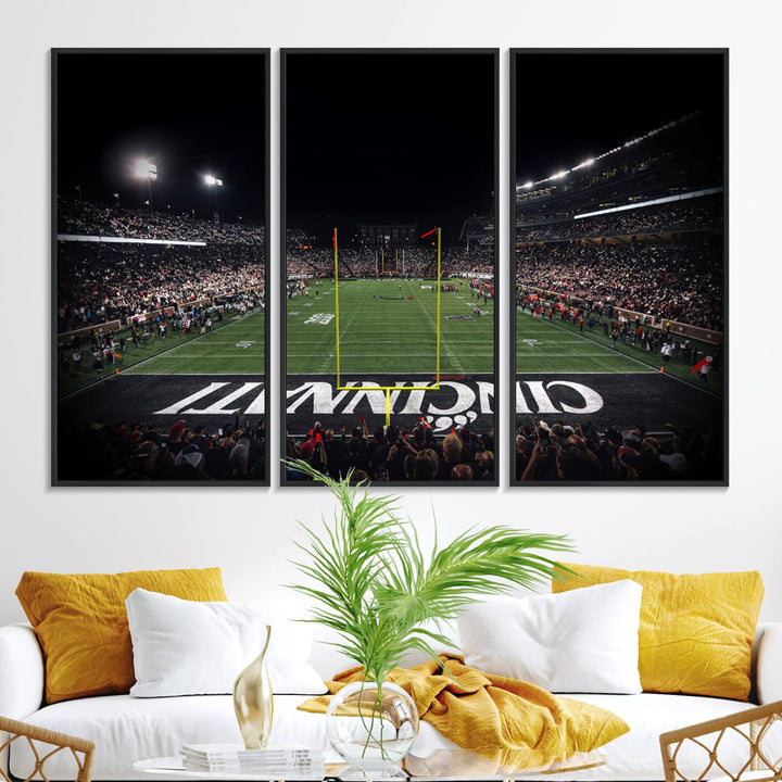 Interior view featuring a Cincinnati Bearcats football canvas of Nippert Stadium.