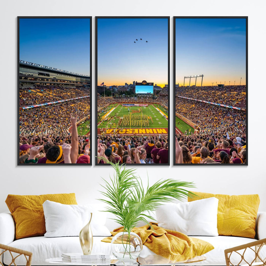 Canvas wall art featuring the University of Minnesota Football Team print, showcasing Huntington Bank Stadium at sunset with jets overhead.