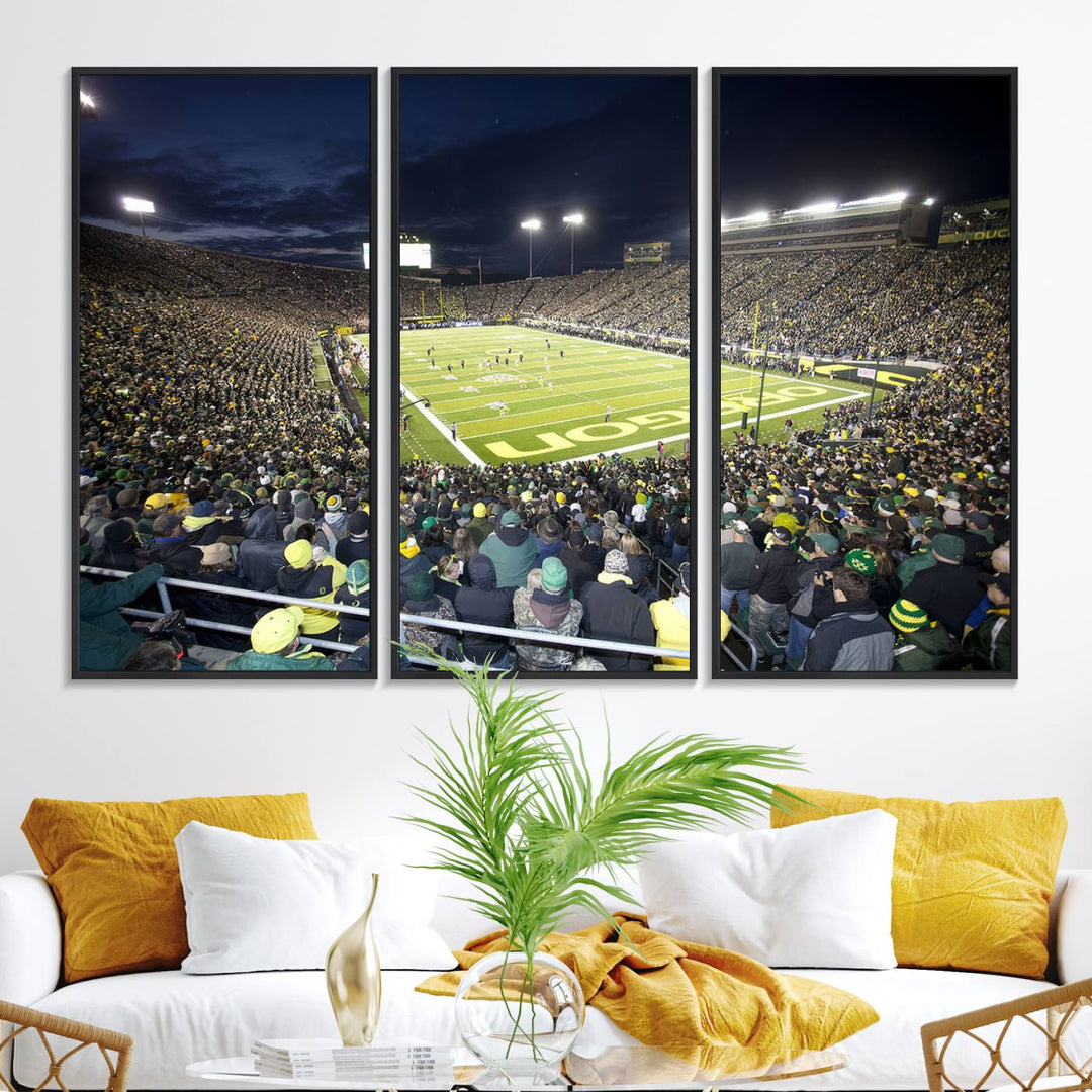 Under bright lights, a University of Oregon Ducks Canvas Print captures the excitement of fans packing Autzen Stadium for a night football game.