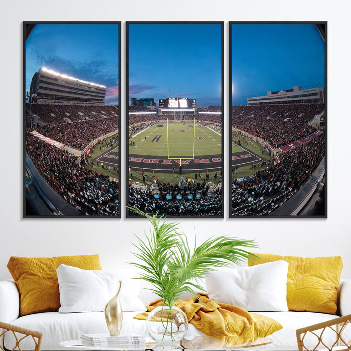 The wall art in the living room features a Texas Tech Red Raiders Football Team Print, showcasing Jones AT&T Stadium at dusk.