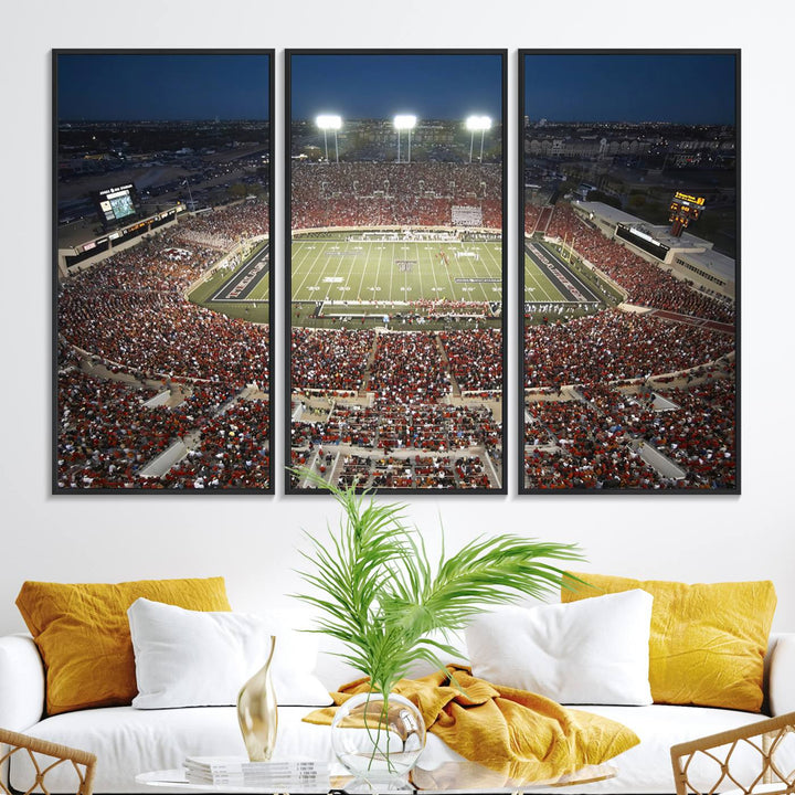 Canvas wall art featuring an aerial view of the Texas Tech Red Raiders packed night game at Lubbock’s Jones AT&T Stadium.