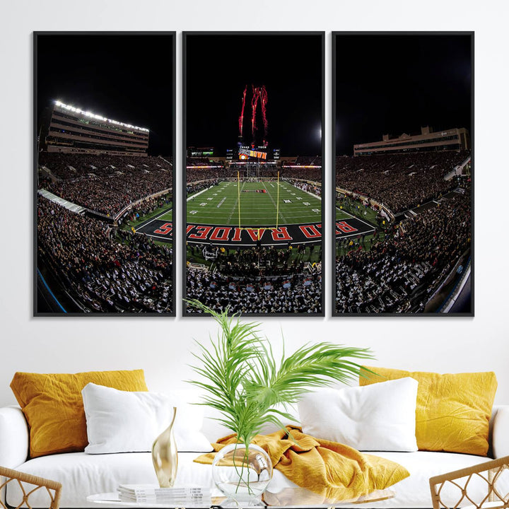 The wall features a Texas Tech Red Raiders Football Team Print on canvas, showcasing fireworks over a packed stadium at night.