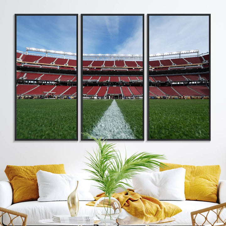 A canvas print of the University of Tulsa Golden Hurricane showcases H.A. Chapman Stadiums football field and red seats against a backdrop of a blue sky.