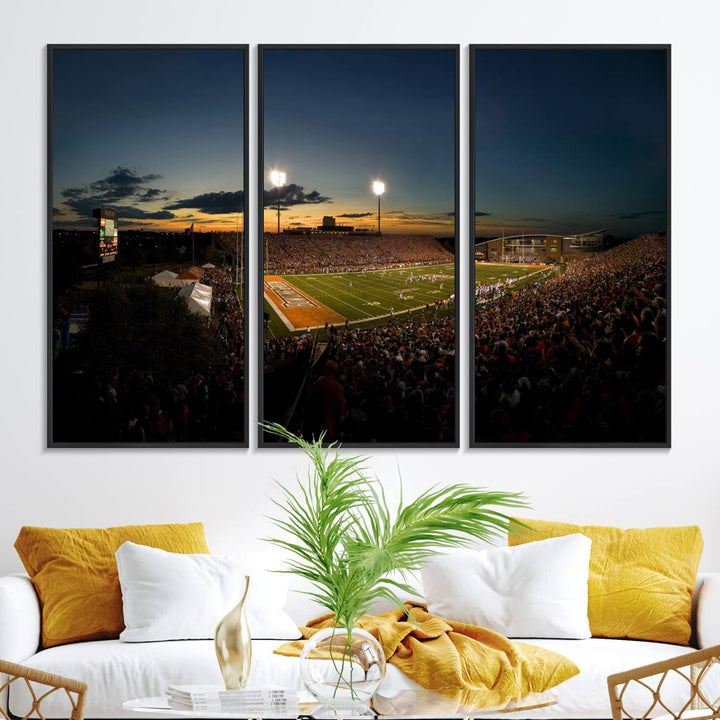 Ball State Cardinals Football Team Print - Muncie Scheumann Stadium Canvas featuring a sunset, floodlights, and lively crowd.