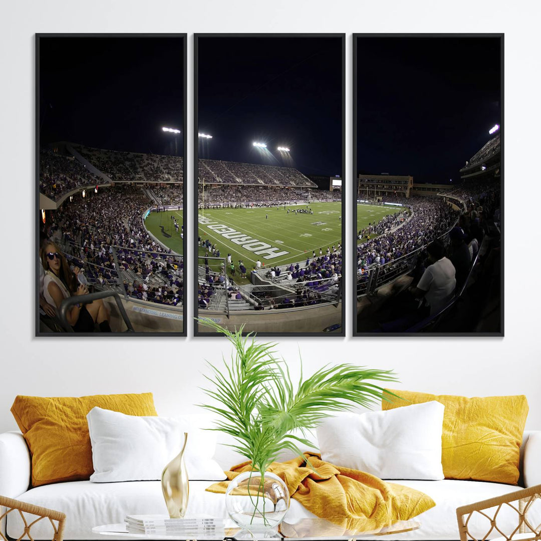 The wall art print features a night view of Amon G. Carter Stadium filled with TCU fans, showcased in the Horned Frogs Football Canvas Wall Art.