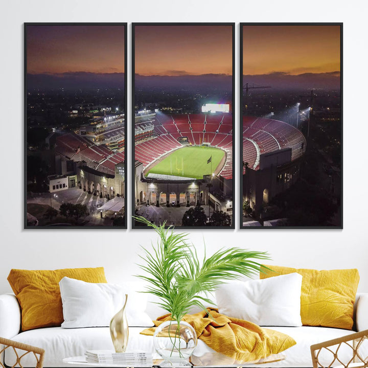 The USC Trojans Stadium canvas captures Memorial Coliseum at twilight, showcasing red seats and a green field beneath an orange sky.