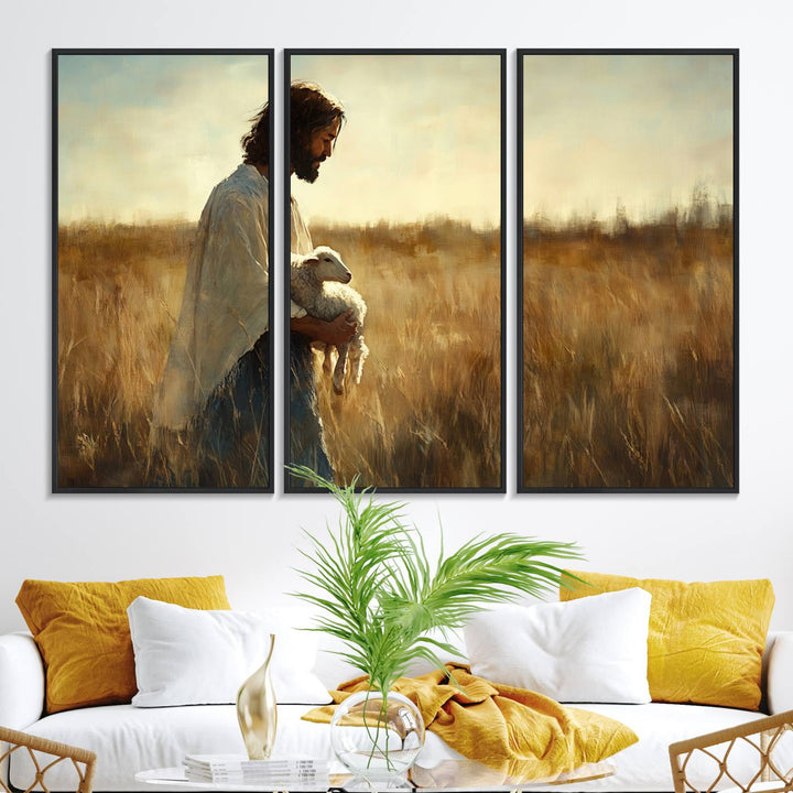 The Jesus the Good Shepherd wall art print depicts Jesus gently holding a lamb under a clear sky.