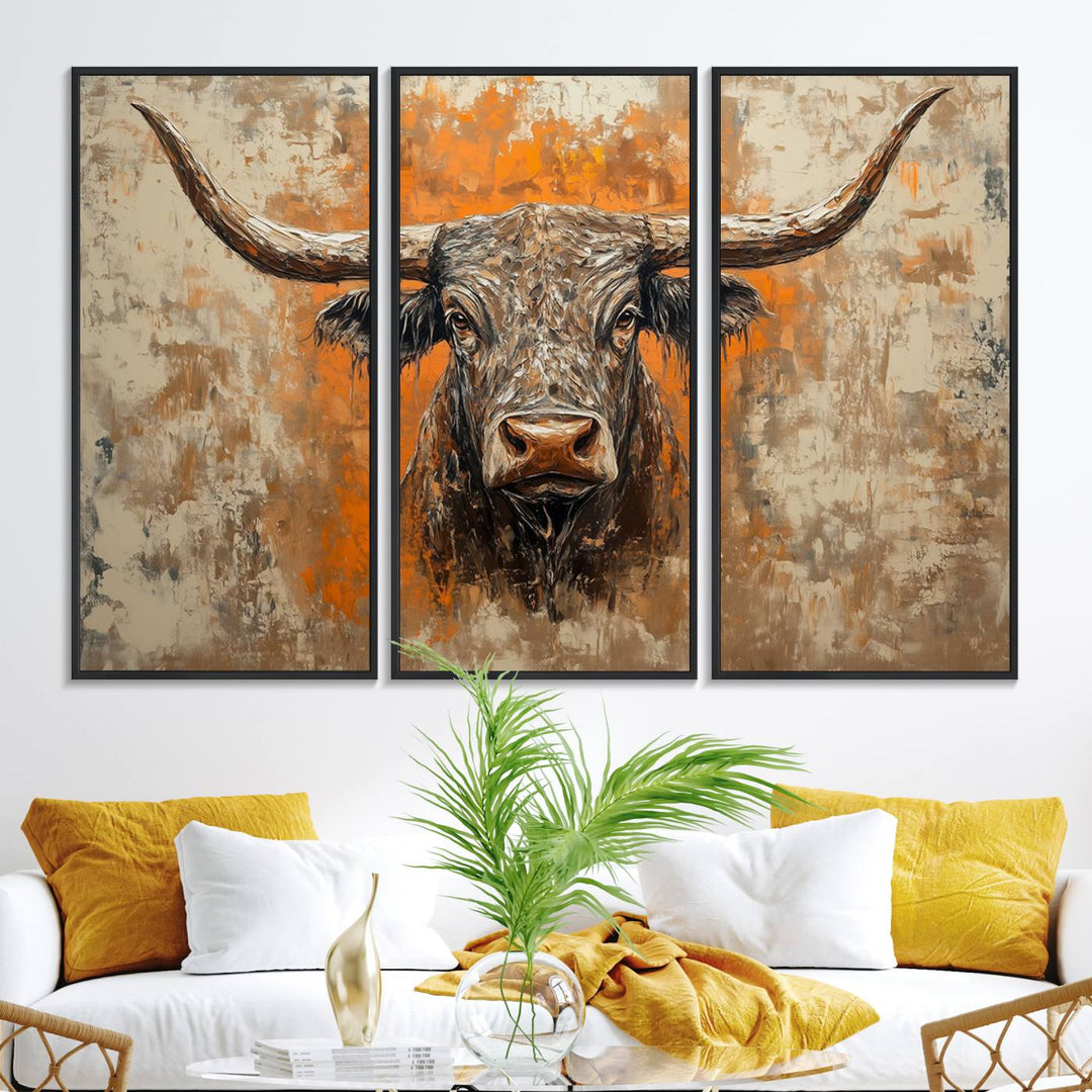 Abstract Cow Longhorn Bull Wall Art presents a detailed face centered on a textured orange and beige background.