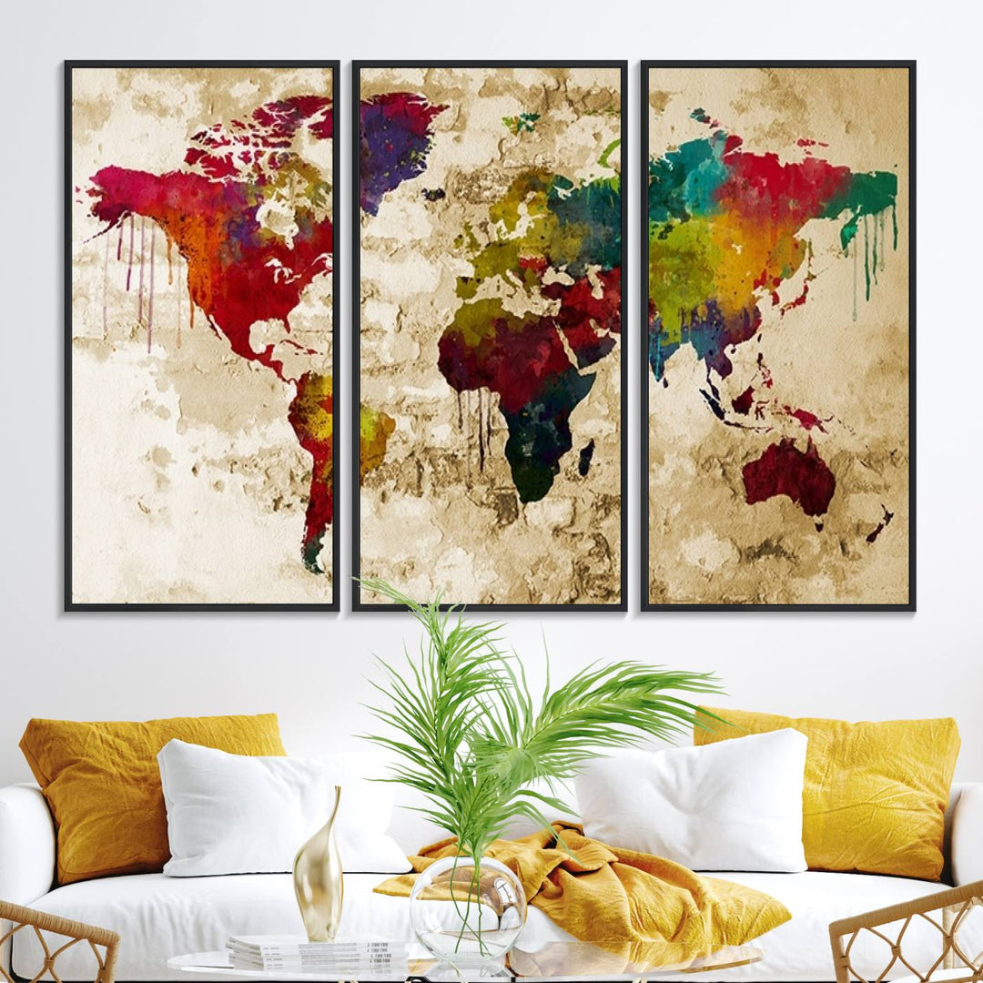 The Rainbow Colored Vintage World Map Canvas Print decorates the room.
