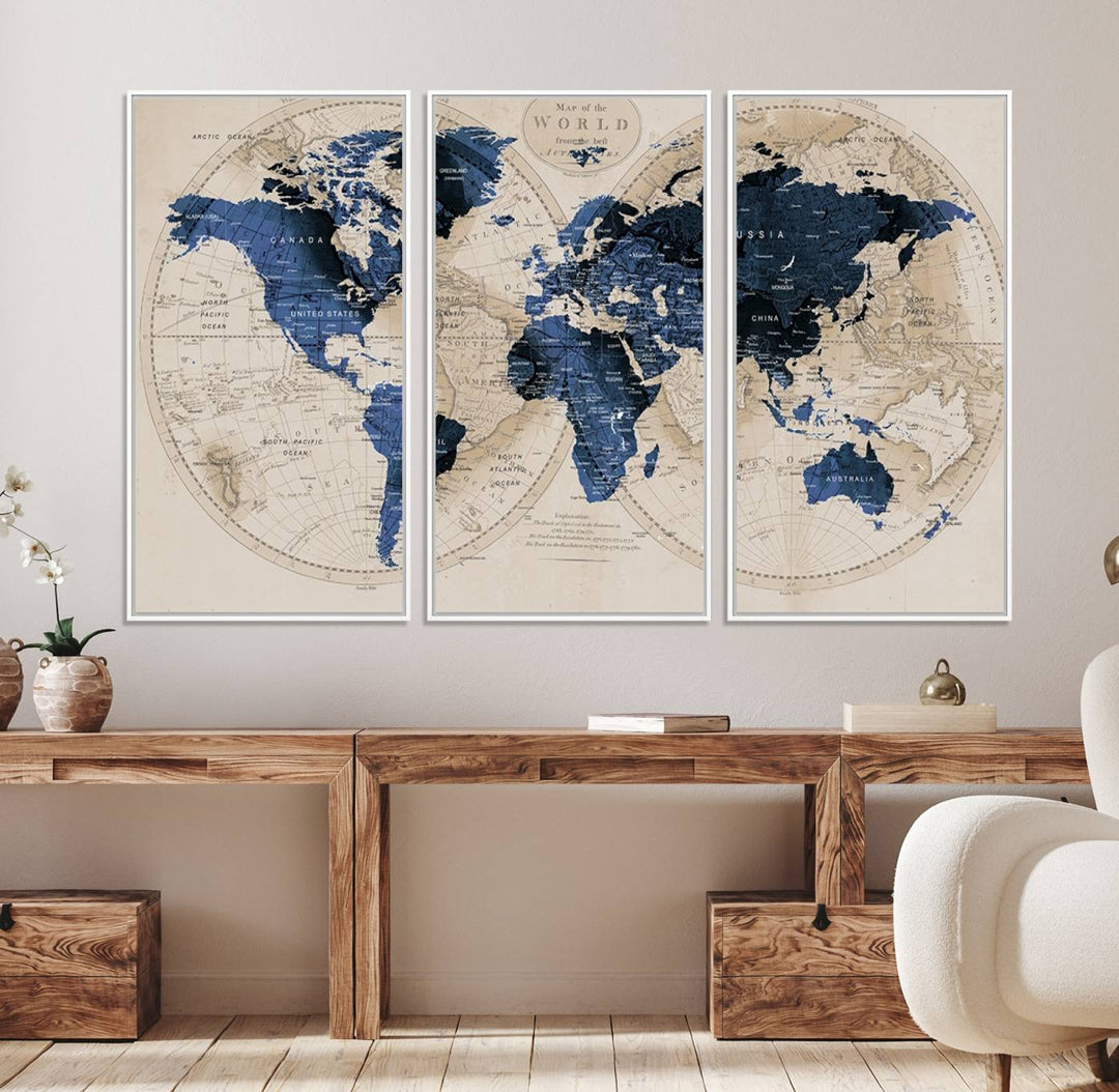 The Vintage Triptych Map Print is a grunge-stained blue and beige world map, perfect for enhancing wall decor.