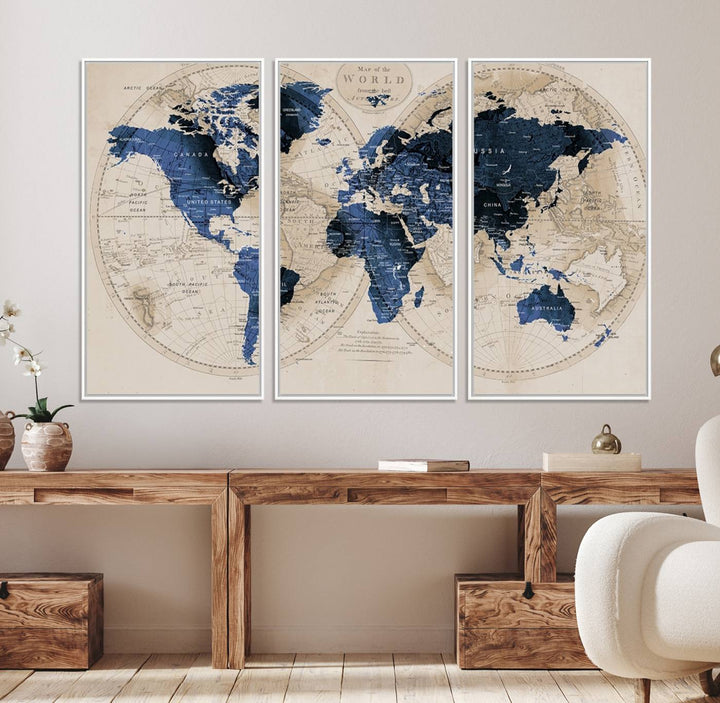 The Vintage Triptych Map Print is a grunge-stained blue and beige world map, perfect for enhancing wall decor.