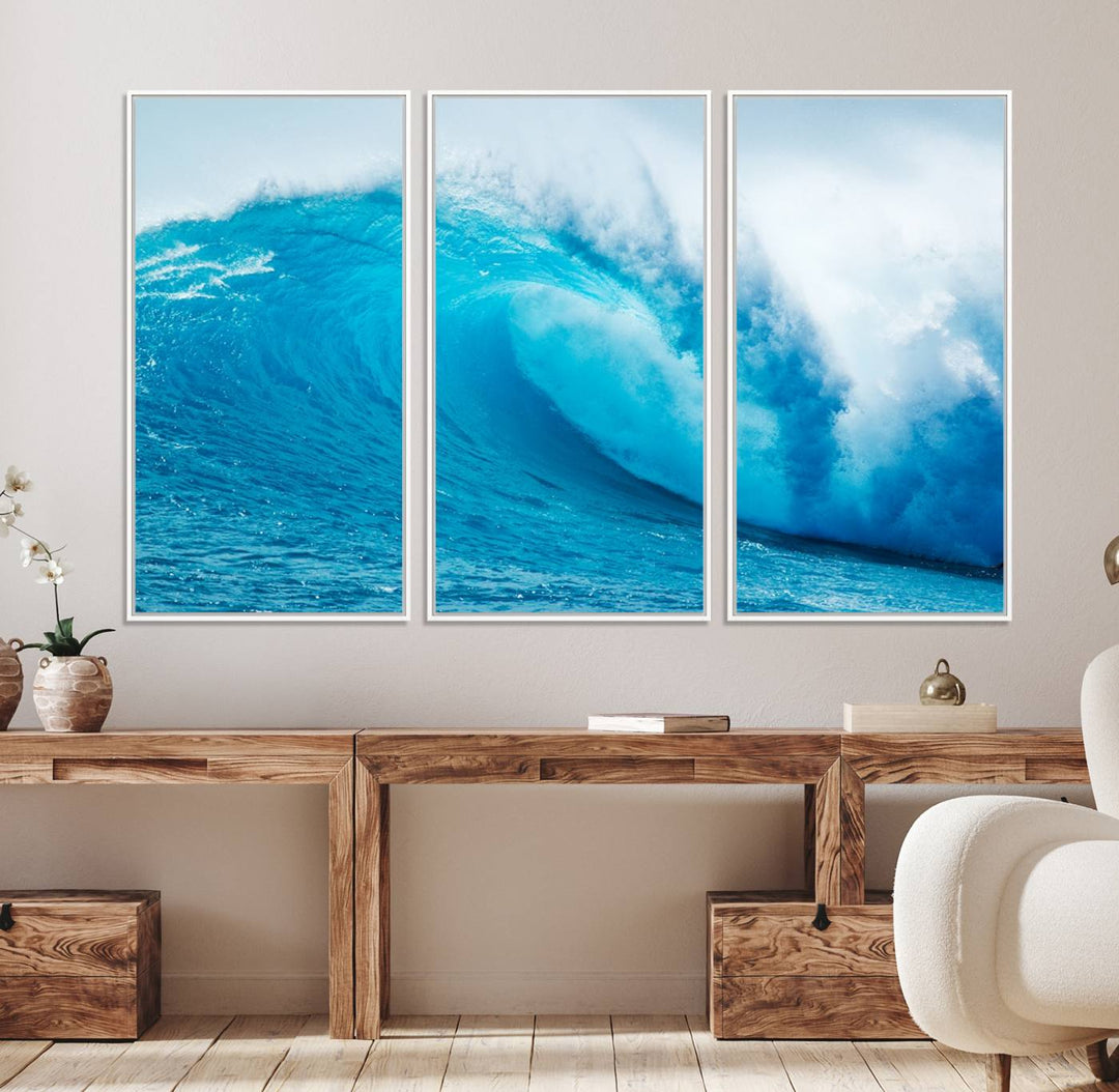 A museum-quality canvas depicting a vibrant blue ocean wave with white foam under a clear sky.